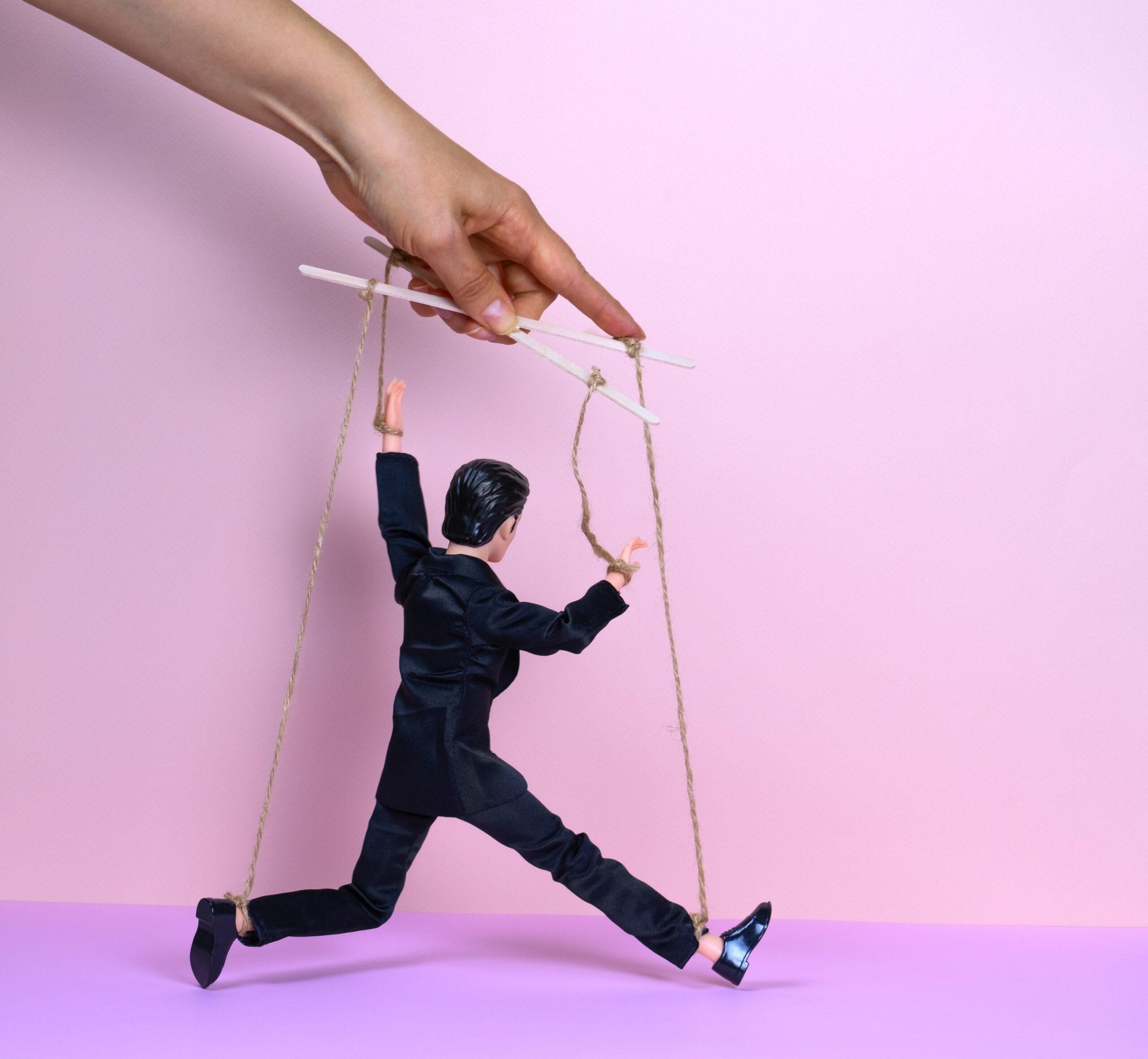 Controlling Partner Behaviour Signs - female hand on man