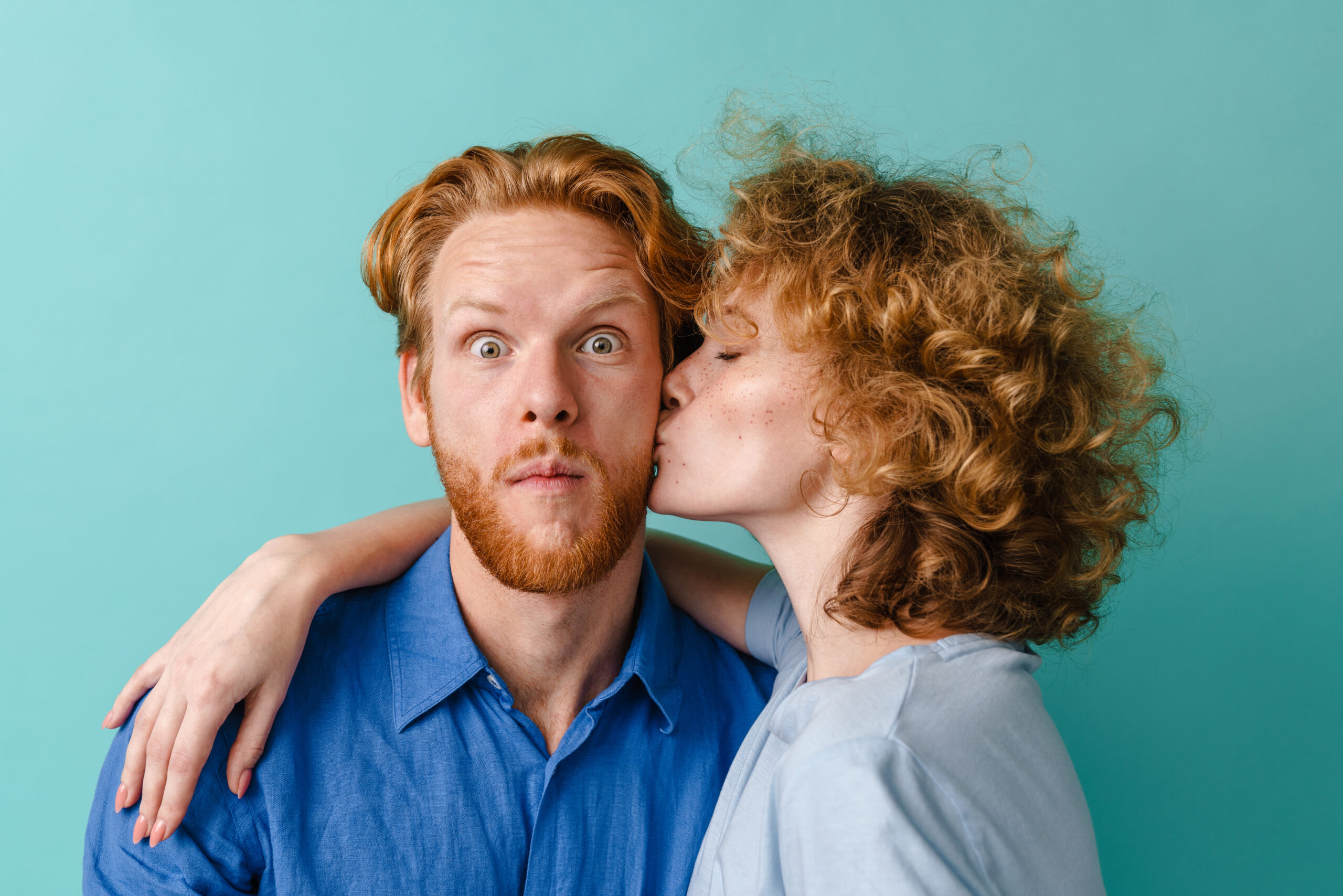 Dating Preferences for Redheads - redhead kissing surprised man