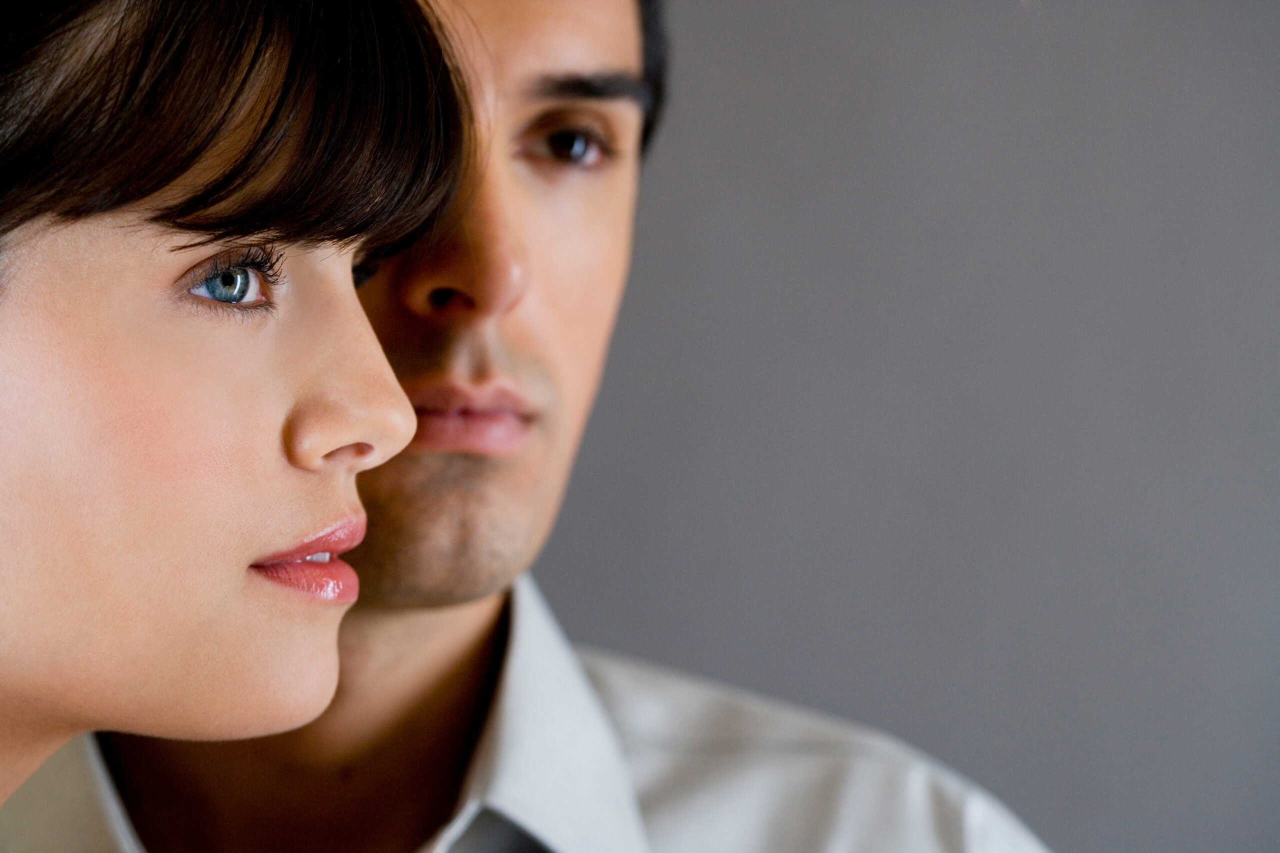 Toxic Relationship Warning Signs You Must Not Overlook - Young couple staring at screen