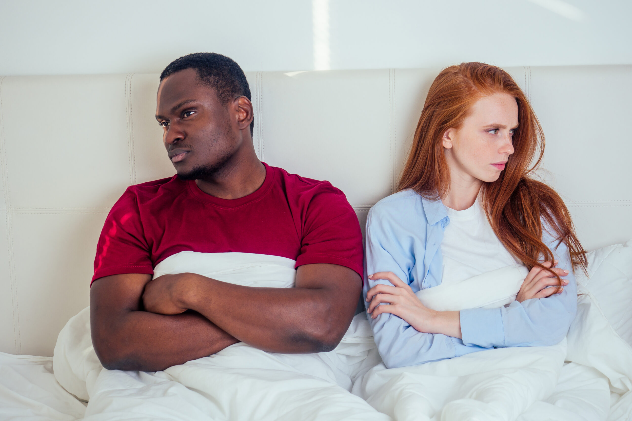 Toxic Relationship Warning Signs You Must Not Overlook - couple in bed unhappy