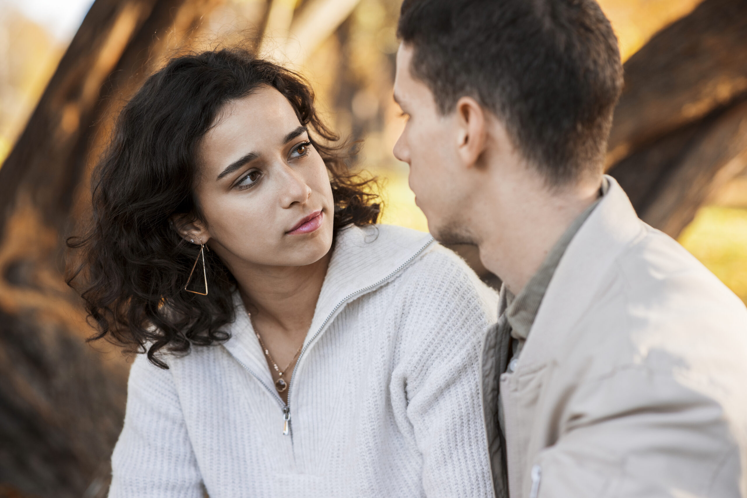 Treat Them Mean Meaning - couple outdoors