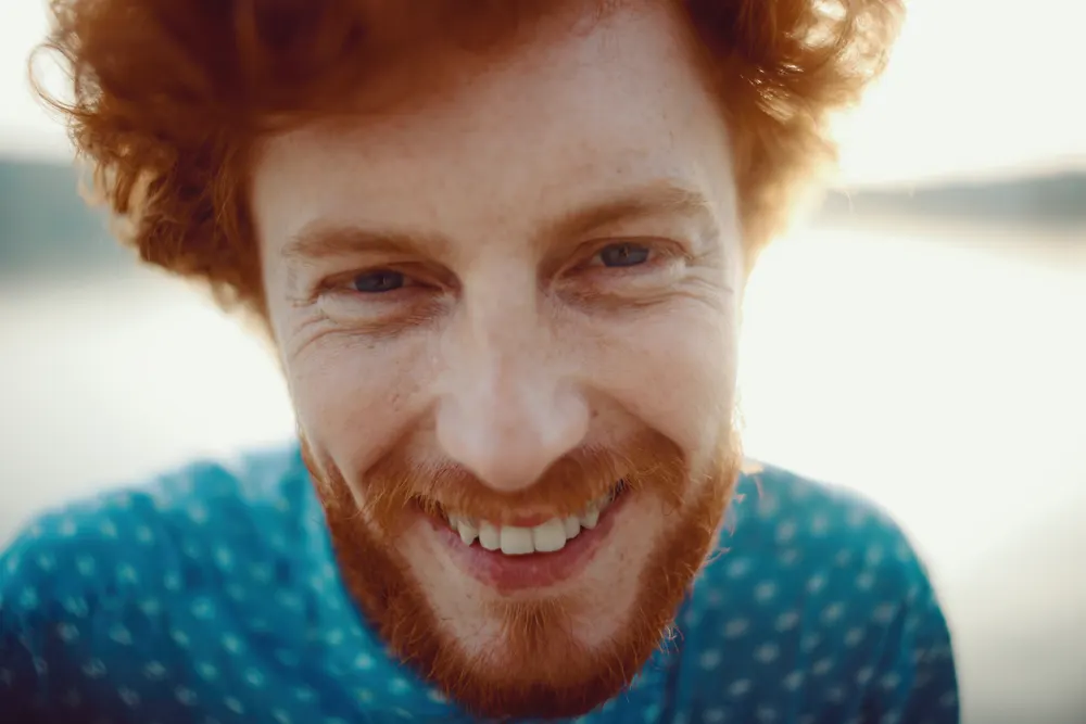 Smiling man with a red beard